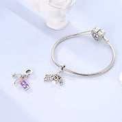Go Study charm – ezüstözött