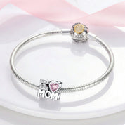 MOM rózsaszín szív charm – ezüstözött