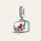 Elsősegélytáska charm – ezüstözött