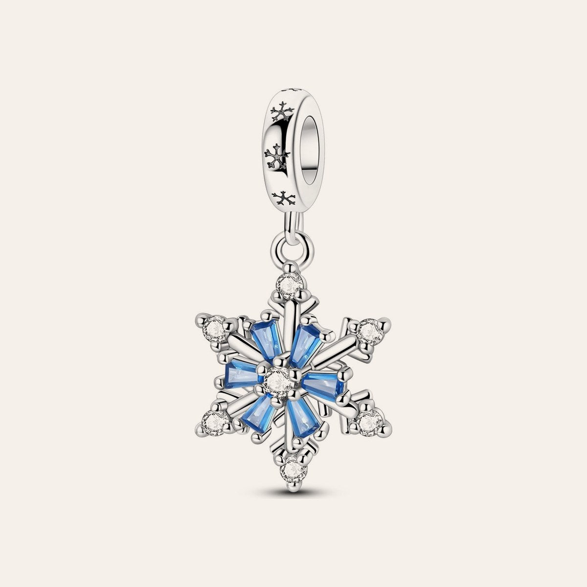 Forgó hópehely charm – ezüstözött