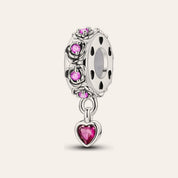 Rózsaszín szívecskés stopper charm – ezüstözött
