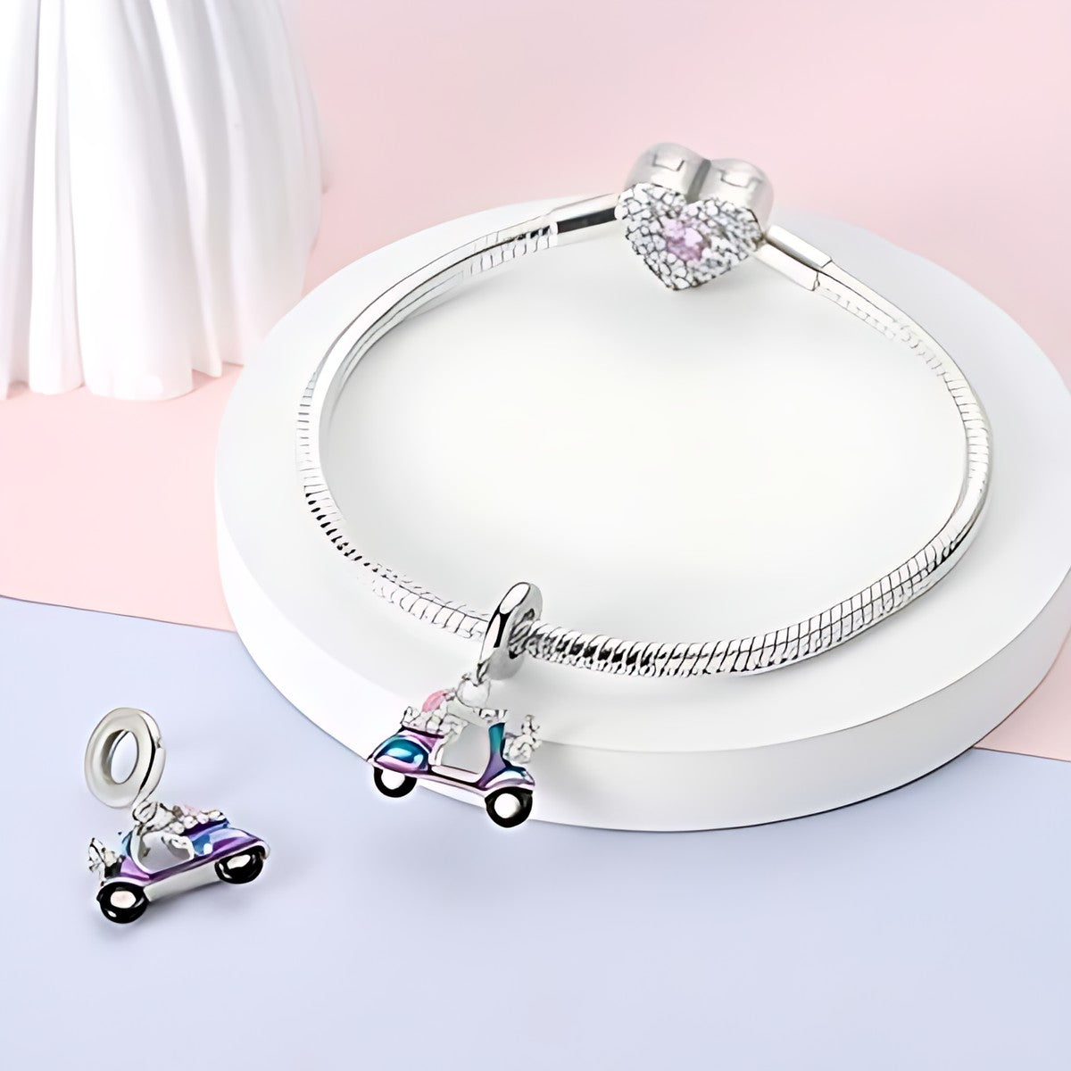 Robogó charm – ezüstözött