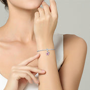 Rózsaszín liliom charm – ezüstözött
