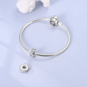 Szikrázó csepp stopper charm – ezüstözött