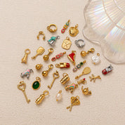 Grâce arany charm