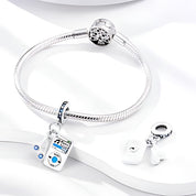 Zenelejátszó charm – ezüstözött